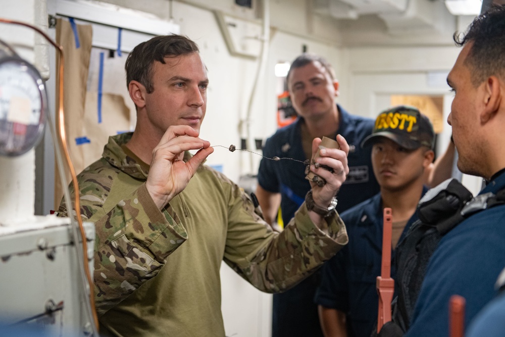 USS Milius (DDG 69) Sails In The Philippine Sea