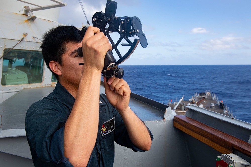 USS Milius (DDG 69) Sails In The Philippine Sea