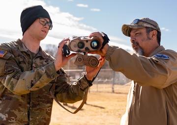 PEO Soldier NET Team Lead Hands Over LTLM II Device to Soldier