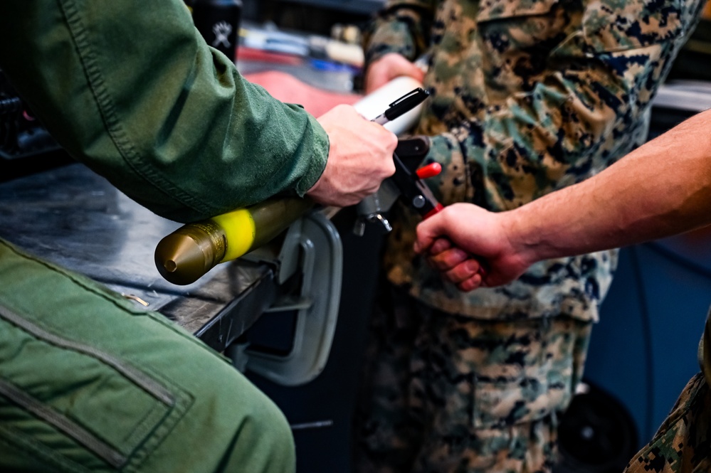 MAG-49 Marines assemble Lethal Ordnance with the help of 305th Airmen