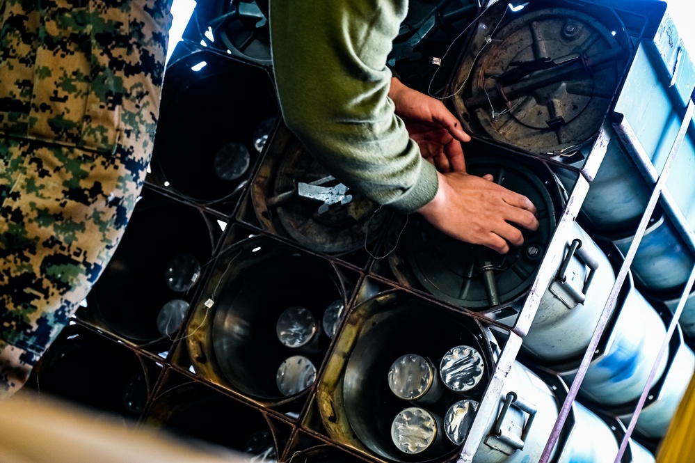 MAG-49 Marines assemble Lethal Ordnance with the help of 305th Airmen