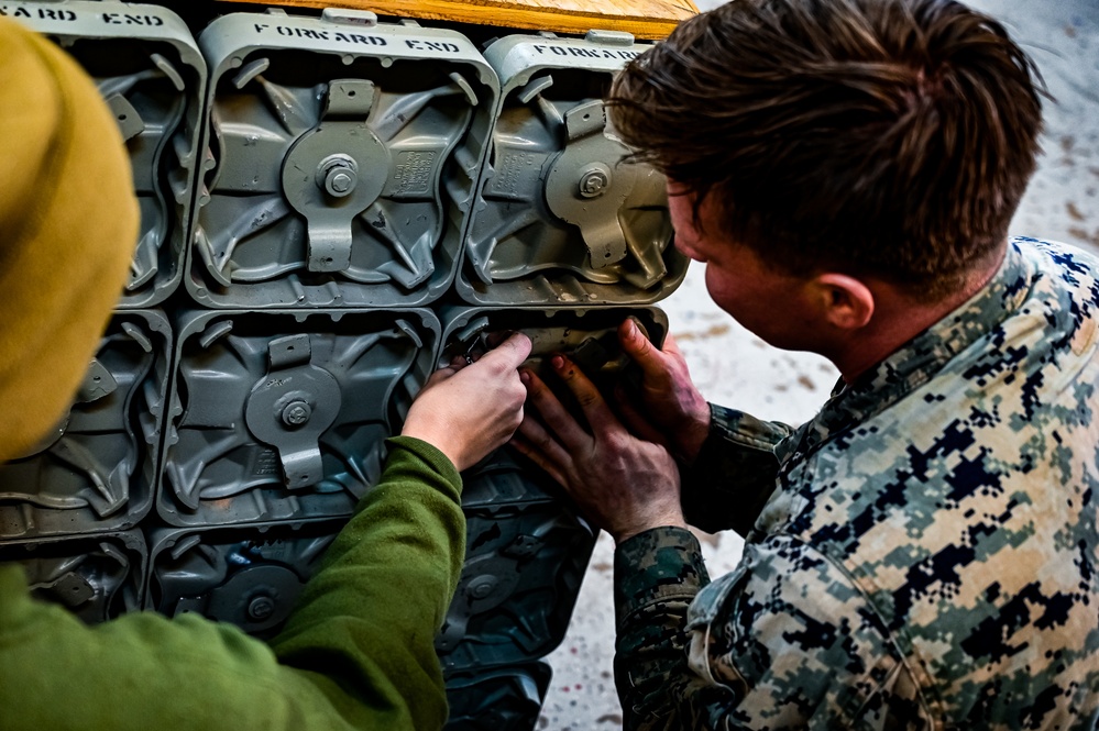 MAG-49 Marines assemble Lethal Ordnance with the help of 305th Airmen