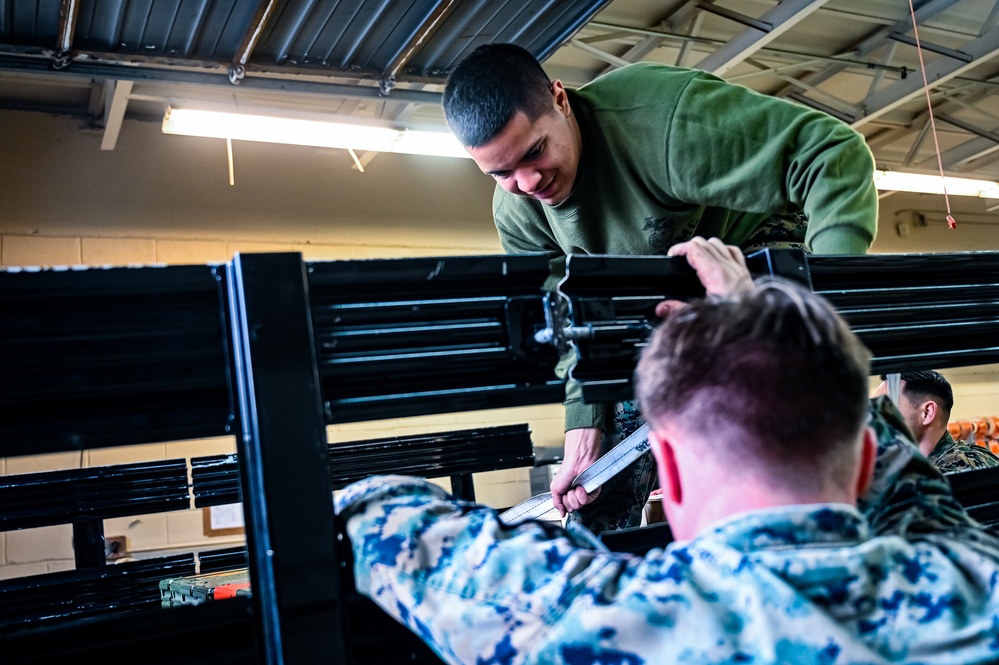 MAG-49 Marines assemble Lethal Ordnance with the help of 305th Airmen