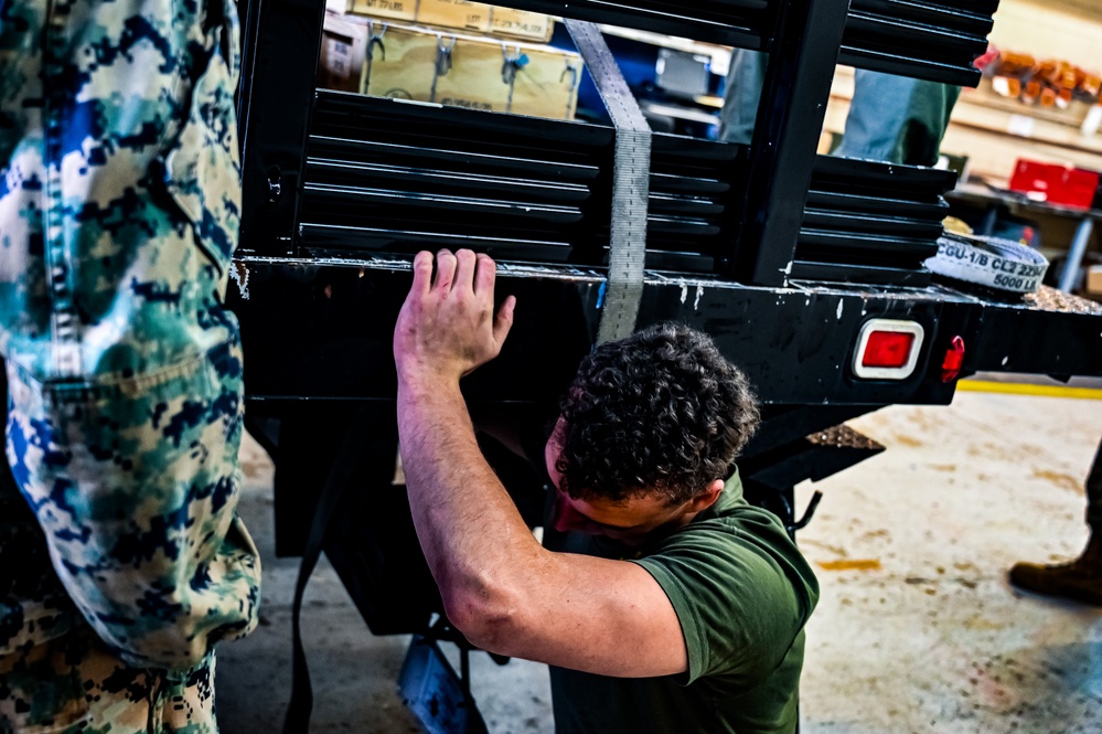 MAG-49 Marines assemble Lethal Ordnance with the help of 305th Airmen