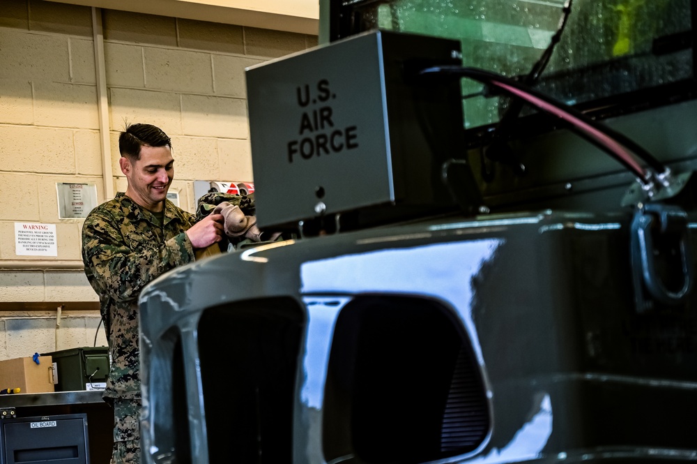 MAG-49 Marines assemble Lethal Ordnance with the help of 305th Airmen