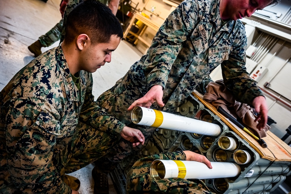 MAG-49 Marines assemble Lethal Ordnance with the help of 305th Airmen