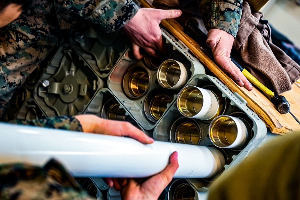 MAG-49 Marines assemble Lethal Ordnance with the help of 305th Airmen