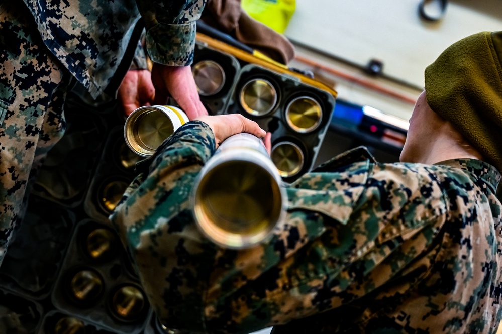 MAG-49 Marines assemble Lethal Ordnance with the help of 305th Airmen