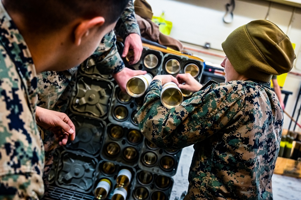 MAG-49 Marines assemble Lethal Ordnance with the help of 305th Airmen