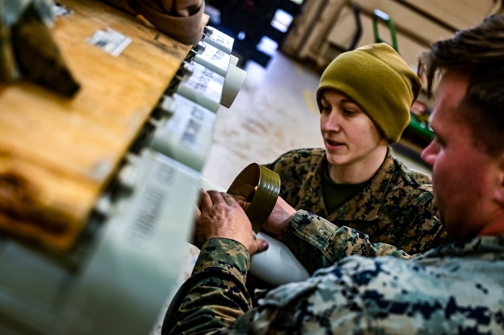 MAG-49 Marines assemble Lethal Ordnance with the help of 305th Airmen