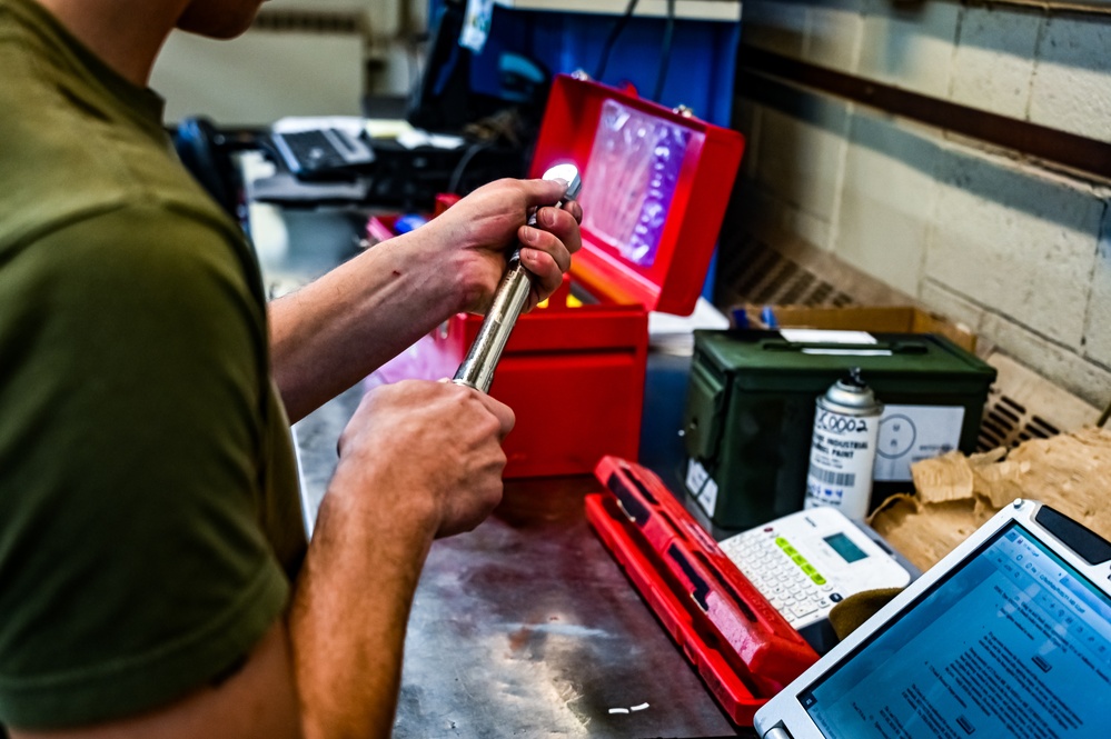 MAG-49 Marines assemble Lethal Ordnance with the help of 305th Airmen