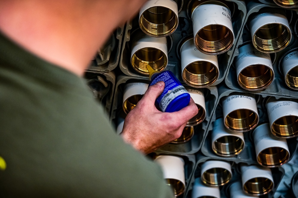 MAG-49 Marines assemble Lethal Ordnance with the help of 305th Airmen