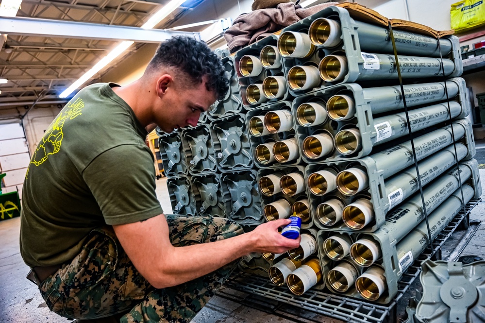 MAG-49 Marines assemble Lethal Ordnance with the help of 305th Airmen