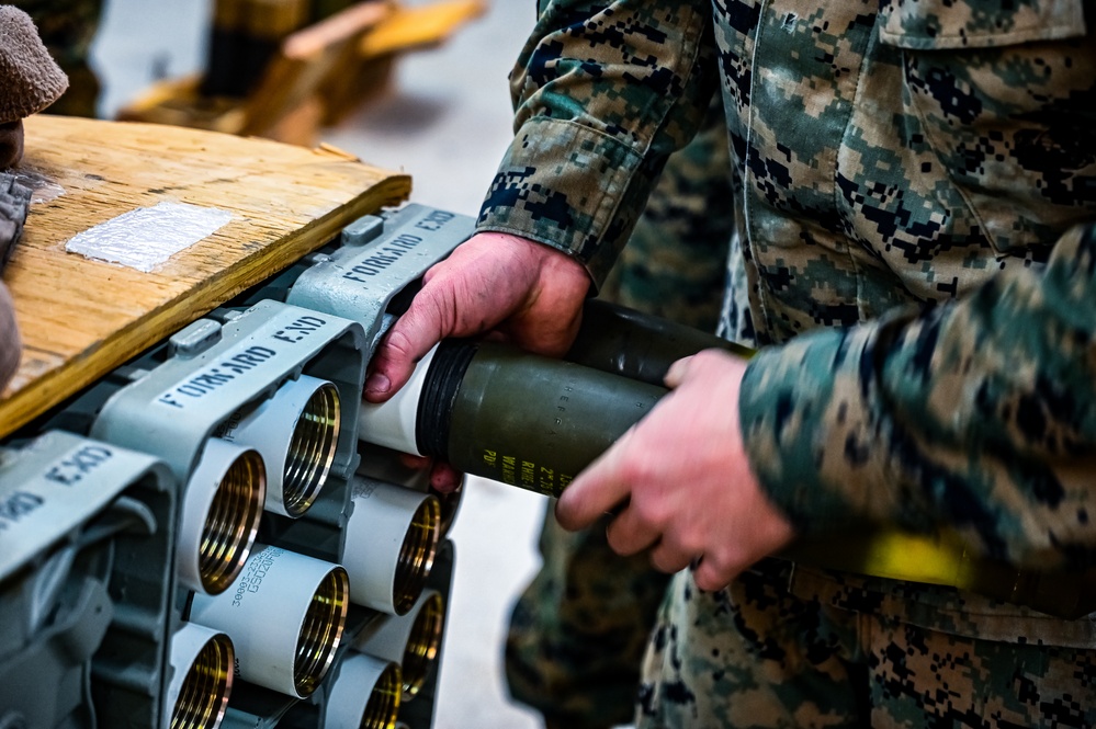 MAG-49 Marines assemble Lethal Ordnance with the help of 305th Airmen