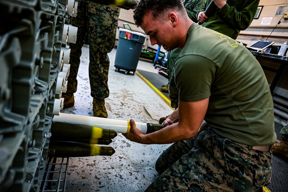 MAG-49 Marines assemble Lethal Ordnance with the help of 305th Airmen