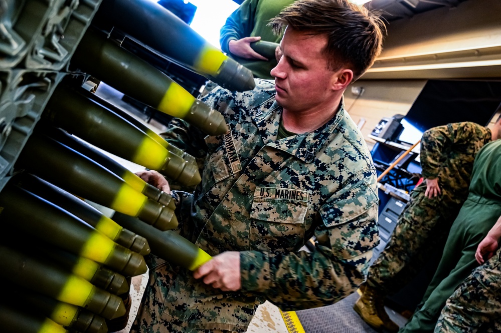 MAG-49 Marines assemble Lethal Ordnance with the help of 305th Airmen