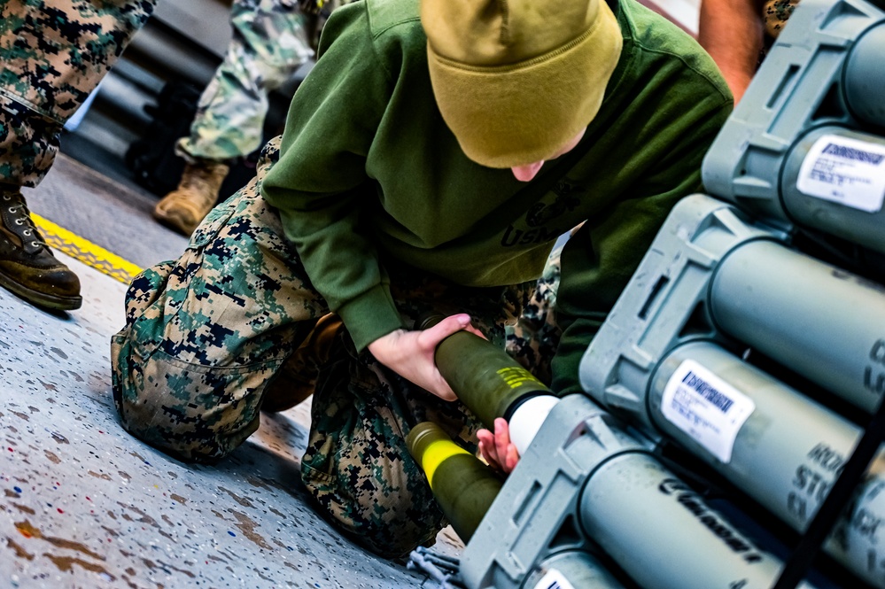 MAG-49 Marines assemble Lethal Ordnance with the help of 305th Airmen