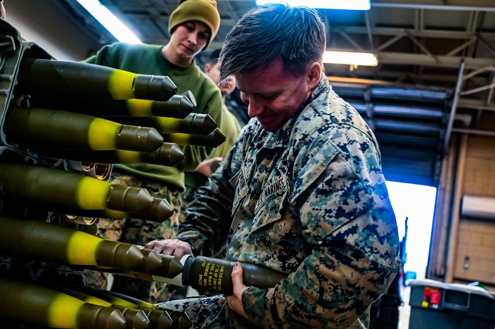 MAG-49 Marines assemble Lethal Ordnance with the help of 305th Airmen