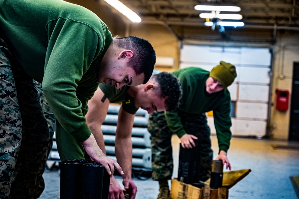 MAG-49 Marines assemble Lethal Ordnance with the help of 305th Airmen