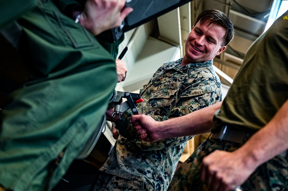 MAG-49 Marines assemble Lethal Ordnance with the help of 305th Airmen