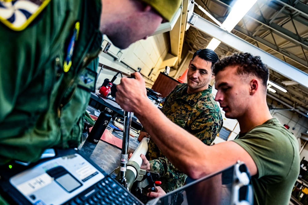 MAG-49 Marines assemble Lethal Ordnance with the help of 305th Airmen