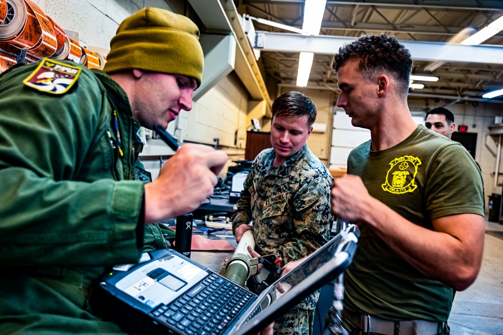 MAG-49 Marines assemble Lethal Ordnance with the help of 305th Airmen