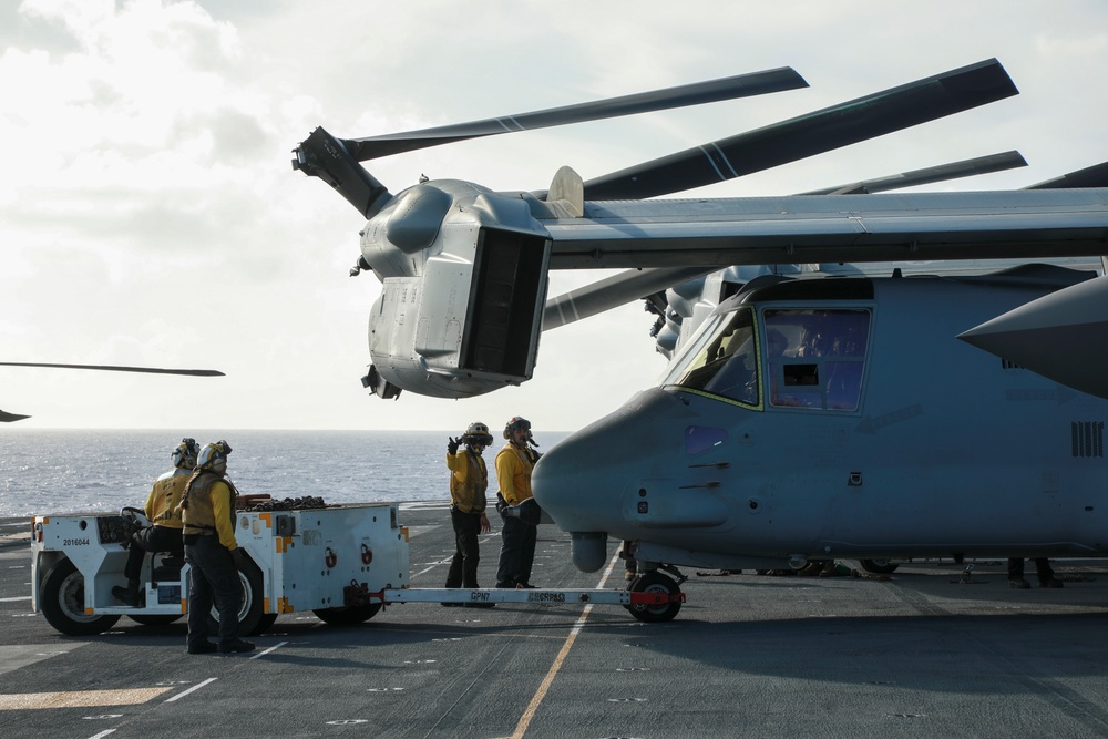 U.S Navy Sailors park MV-22B Osprey