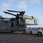 U.S Navy Sailors ground guide MV-22B Osprey