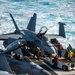 Sailors Taxi Aircraft On The Flight Deck