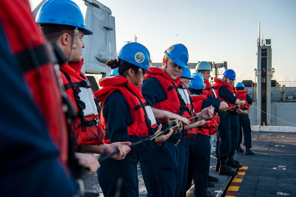 Sailors Pull In The Phone And Distance Line