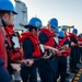 Sailors Pull In The Phone And Distance Line