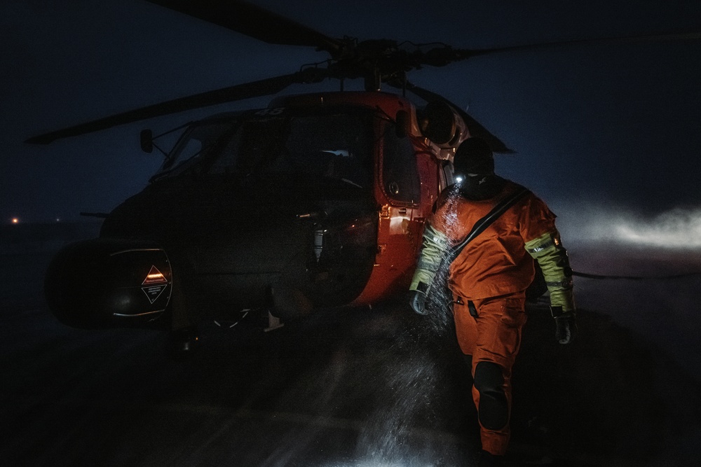 AST1 Evan Gallant conducts post flight inspection