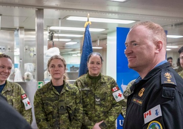 C2F VCOM greets CAF Personnel Aboard Comfort During Homeport Return