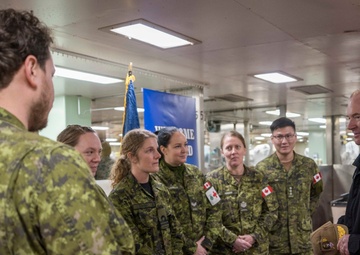 C2F VCOM greets CAF Personnel Aboard Comfort During Homeport Return