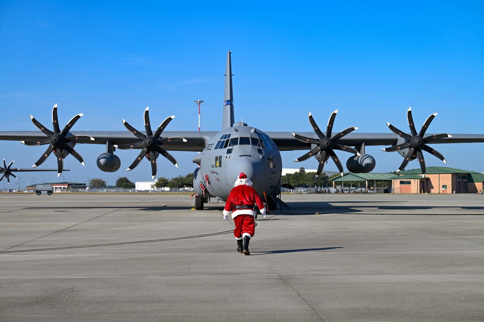 Santa Claus checks out the new C-130H Modifications at the 165 AW