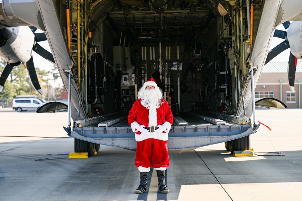 Santa Claus checks out the new C-130H Modifications at the 165 AW