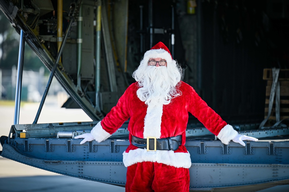 Santa Claus checks out the new C-130H Modifications at the 165 AW