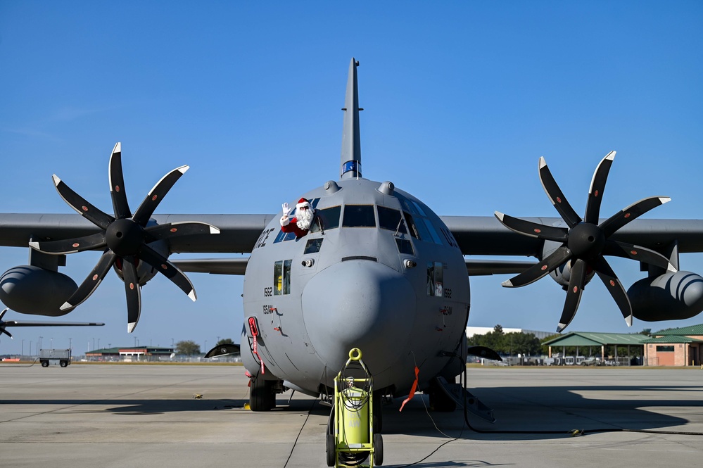 Santa Claus checks out the new C-130H Modifications at the 165 AW