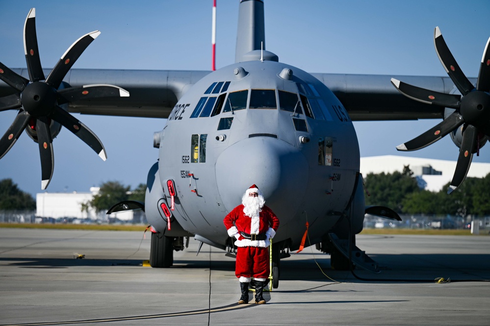 Santa Claus checks out the new C-130H Modifications at the 165 AW