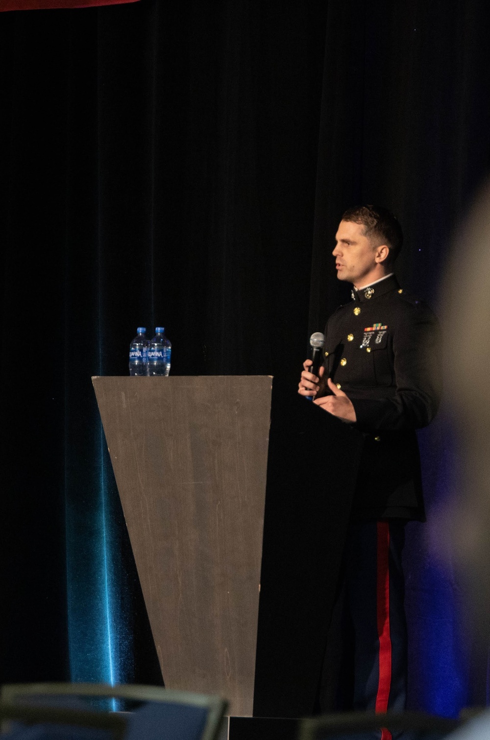 Marines award coaches during the USTFCCCA Convention 2022