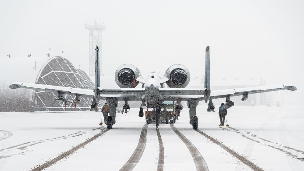 25th FGS crew chiefs tow in the snow