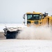 51st CES clears snow from flightline