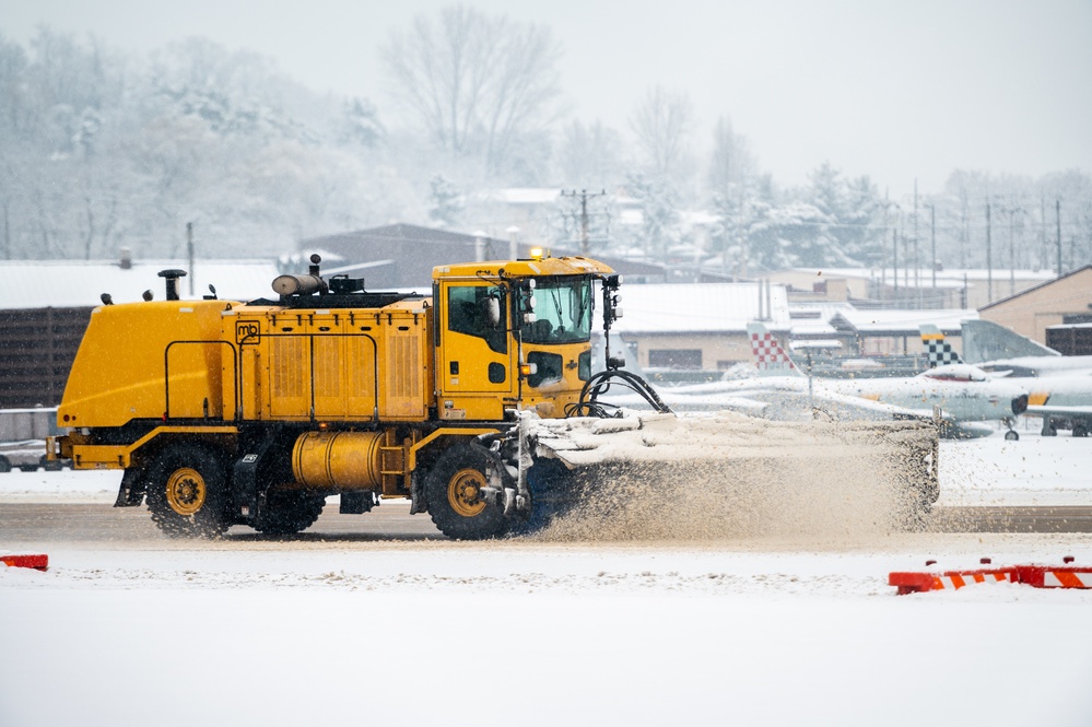 51st CES clears snow from flightline