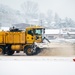 51st CES clears snow from flightline