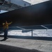 Sailor Directs Aircraft Elevator