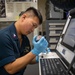 U.S. Navy Sailor Tests Oil Samples