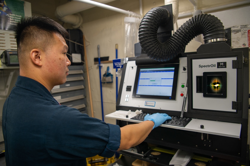 U.S. Navy Sailor Tests Oil Samples