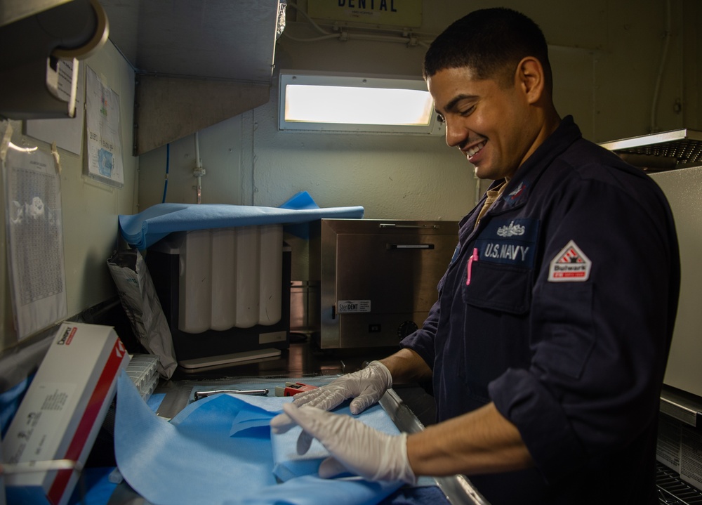 U.S. Navy Sailor Packs Dental Instruments