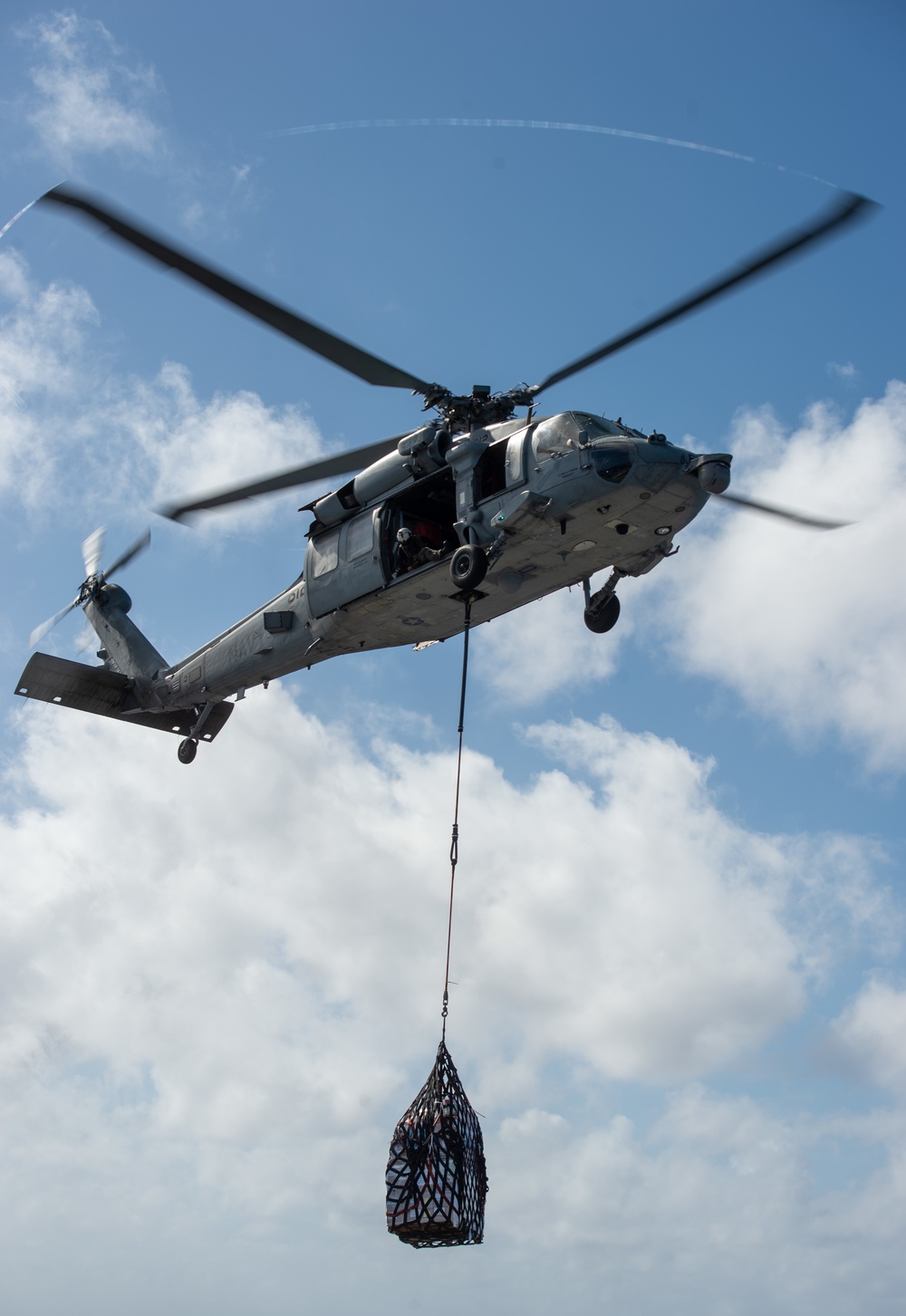 Navy Sailors Participate In A Replenishment At Sea