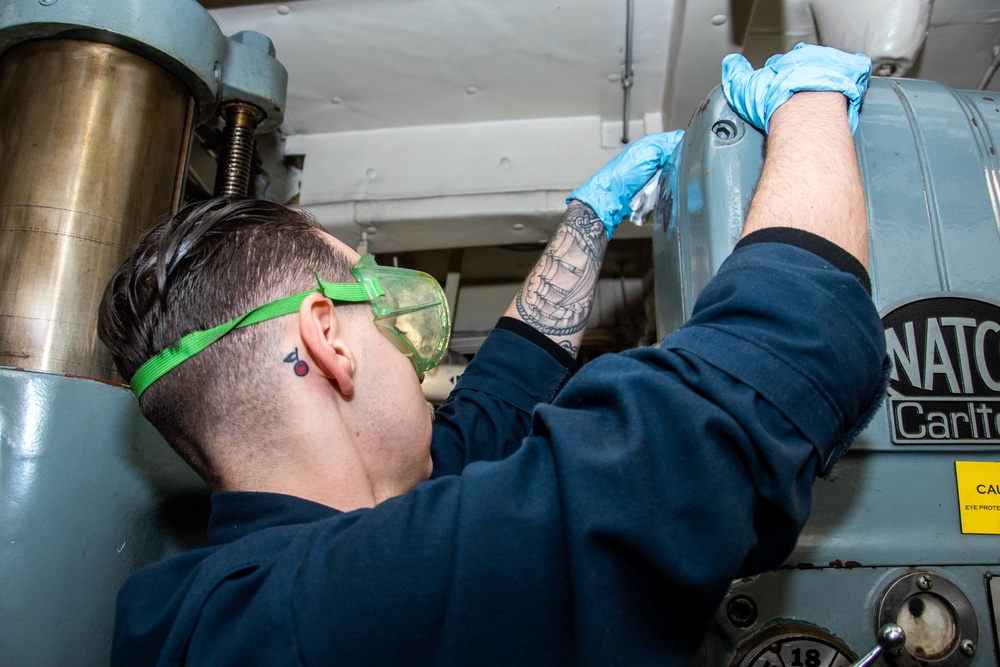 USS Ronald Reagan (CVN 76) Sailors perform maintenance